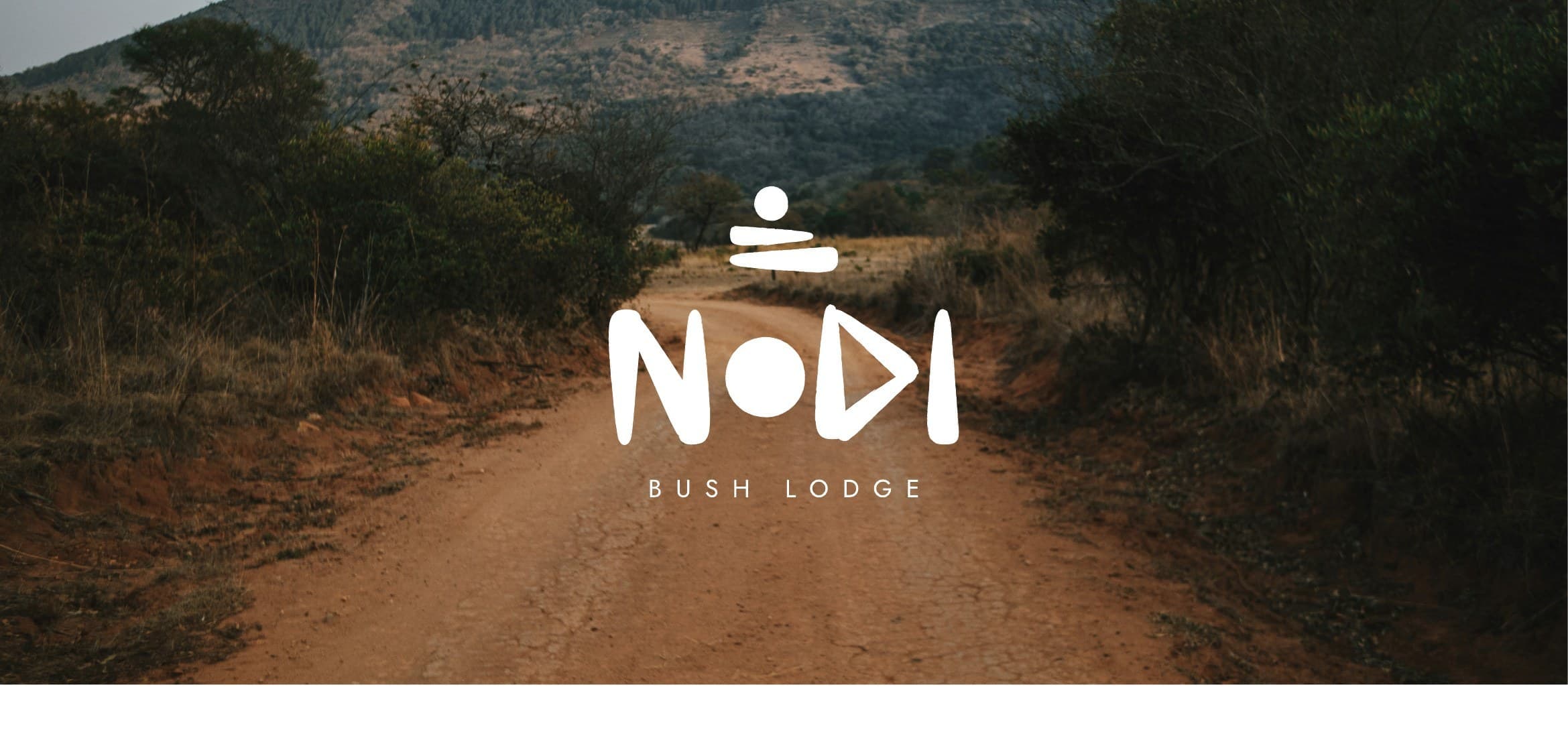 Cover — Nodi Bush Lodge, conceptual case study. Dirt road leading toward the Waterberg mountains.