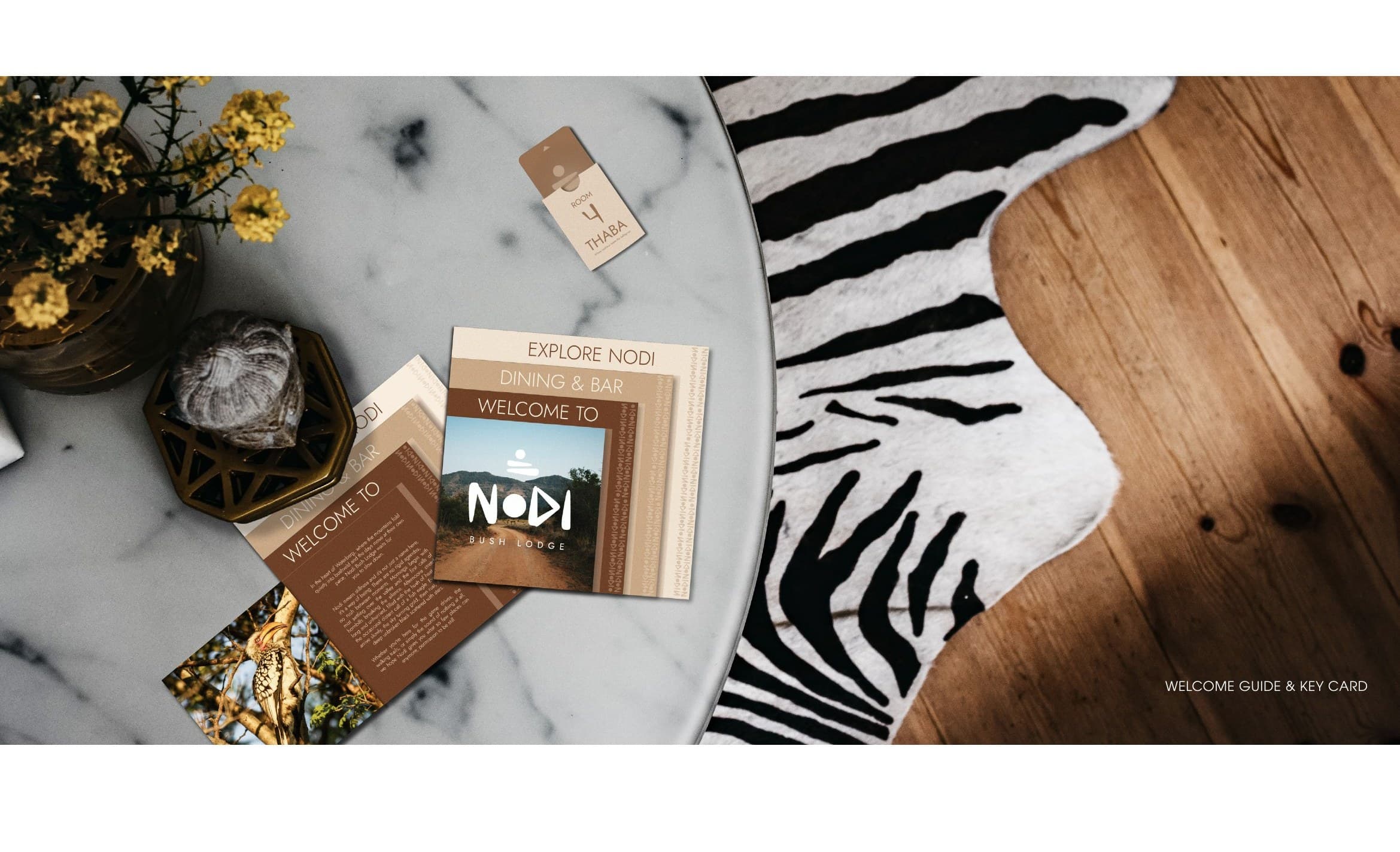 Welcome guide and key card, printed collateral styled on location.